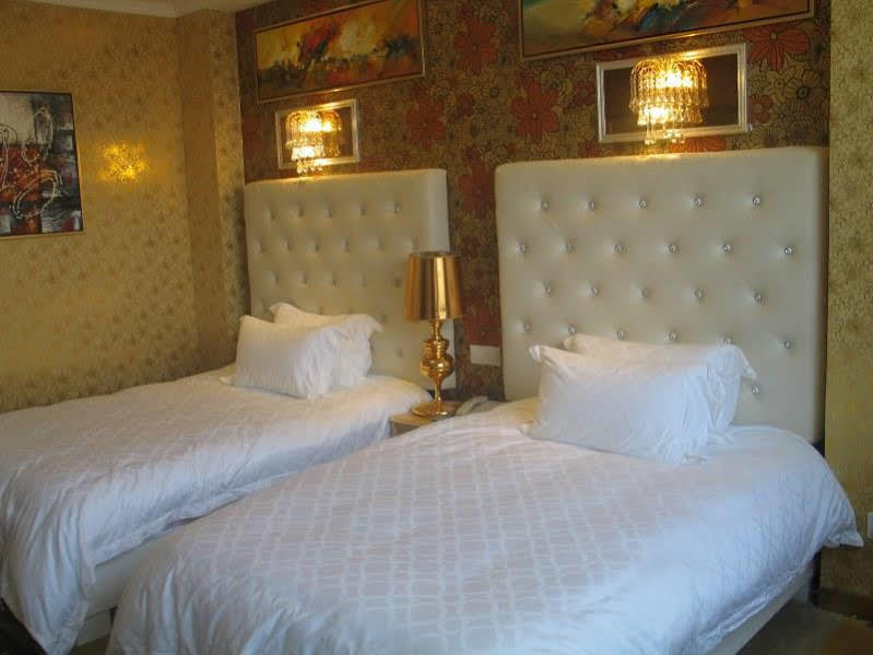 Kapok Hotel Чжухай Экстерьер фото